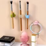 Multipurpose self-adhesive silicone hooks for home, office, and car use.