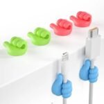 Durable and flexible silicone wall hooks in red, green, and blue.